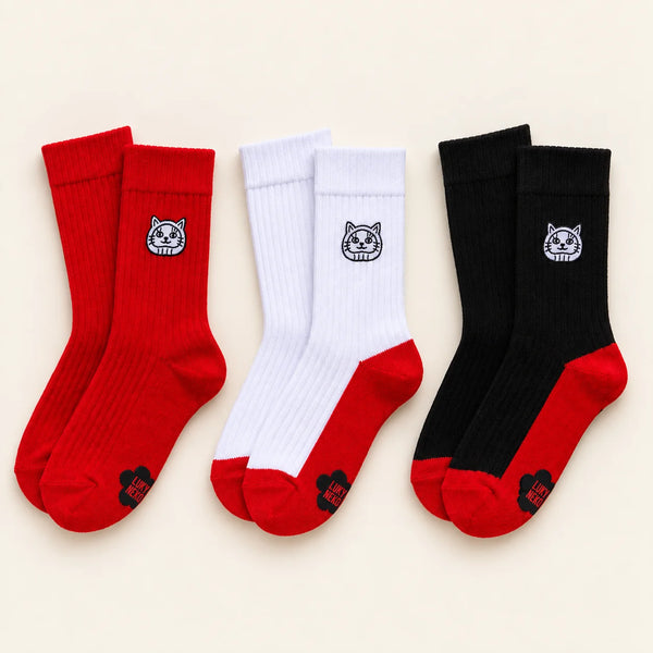 The three pairs of lucky socks in the Lucky Bag 2027: red, black with red sole, white with red sole
